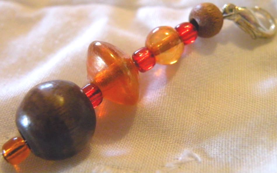 OOAK Hand beaded stitch marker/ zipper pull orange, red and brown glass and wooden beads